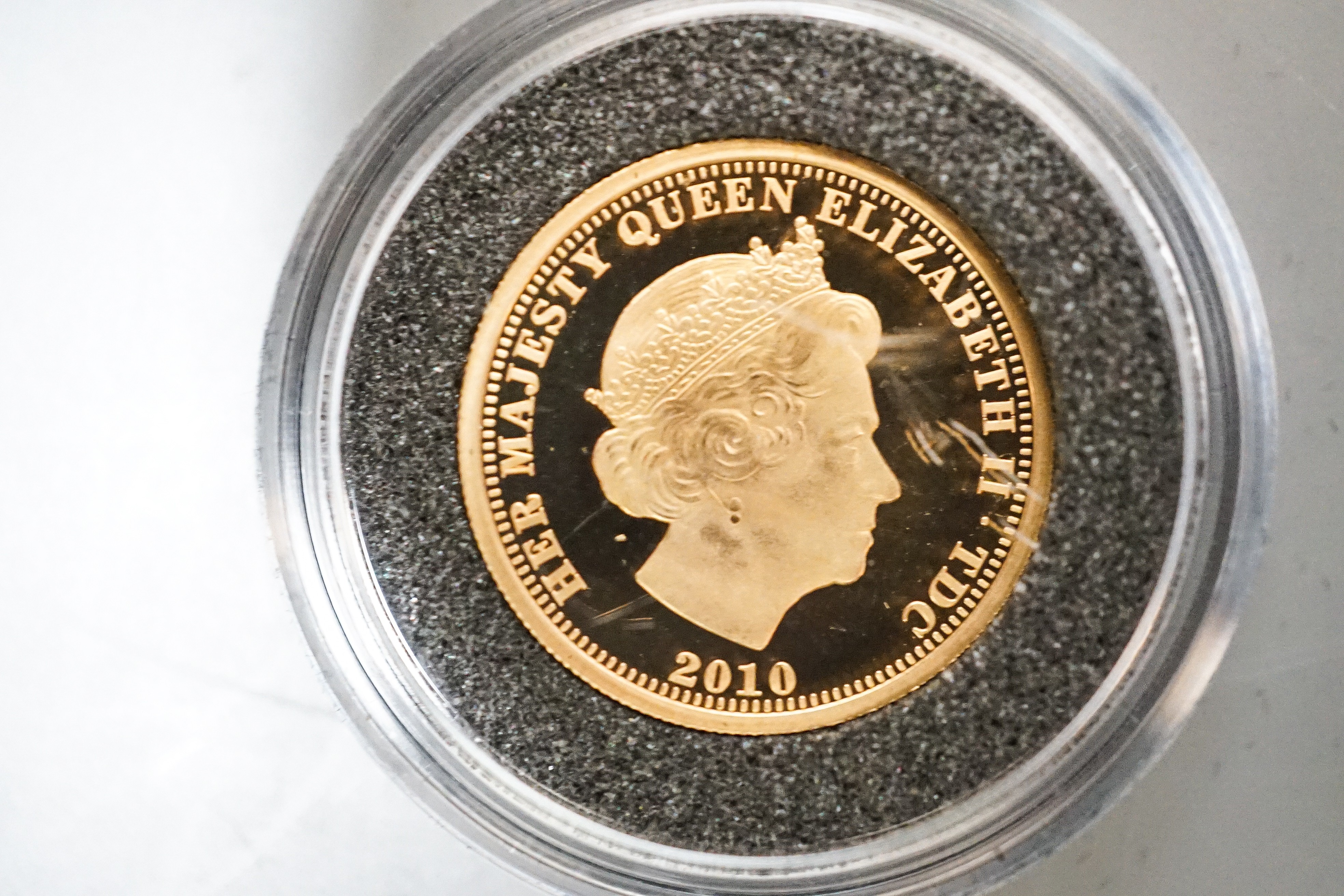 A London mint Tristan da Cunha proof gold sovereign and a similar proof gold Battle of Britain coin, cased with certificates (2)